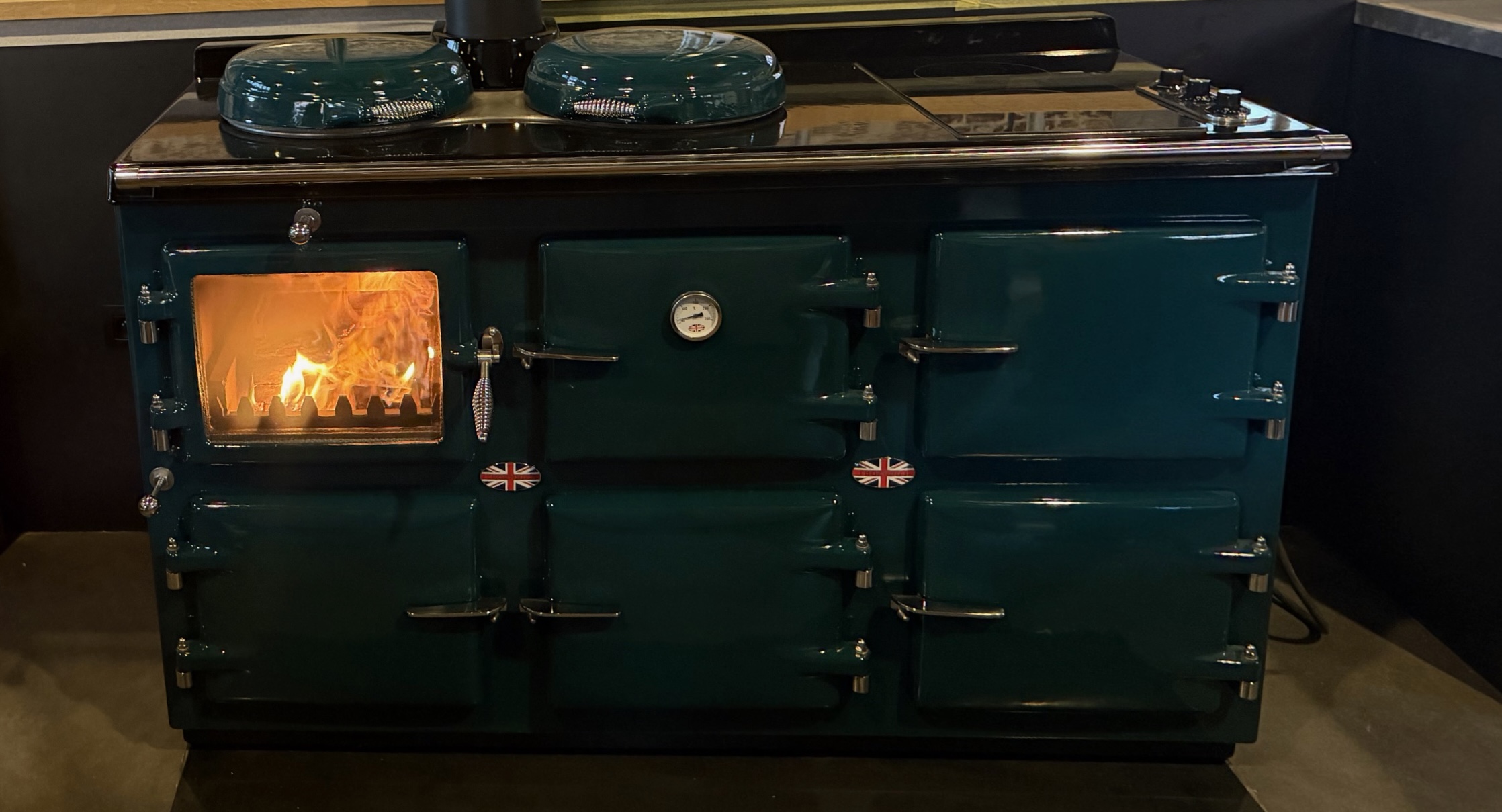 The iconic wood stove that burns proudly at the center of La Kantine